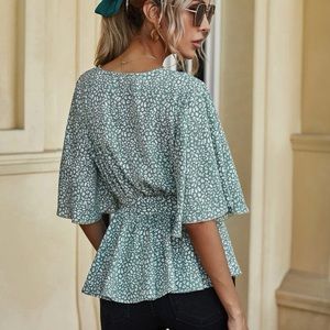 Ruffle top with spotted print